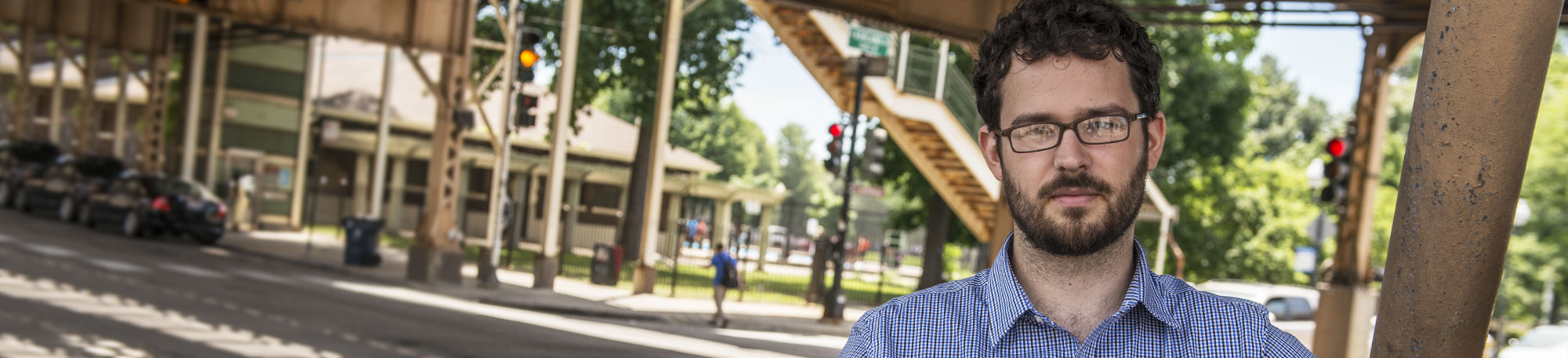 Chicago Harris student Daniel Kay Hertz under the "L" tracks at Lake St. and Ashland Ave.