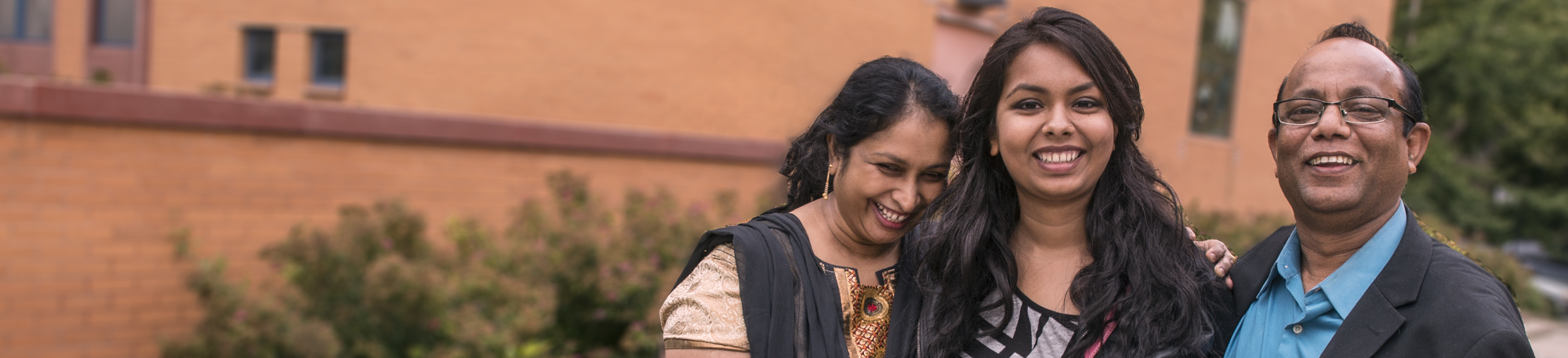 First year UChicago student Nushrat Jahan with her parents Reshma Begum, left, and Abdus Sarker, right.