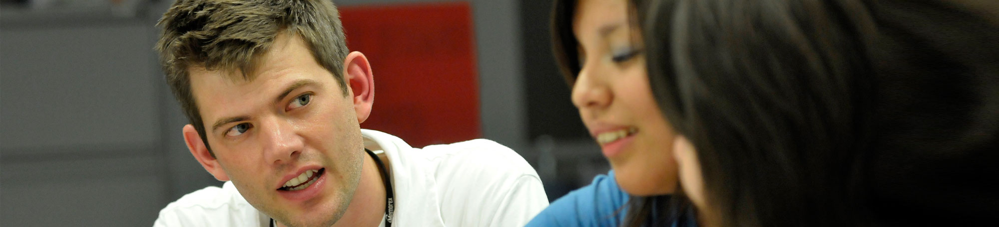 Andy Brake, SSA ’08, helps students