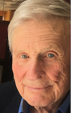 Dr. Charles “Chuck” Winans smiles.