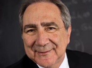 Hugo Sonnenschein smiling wide.