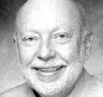 Frank Reynolds smiles in a close-up.