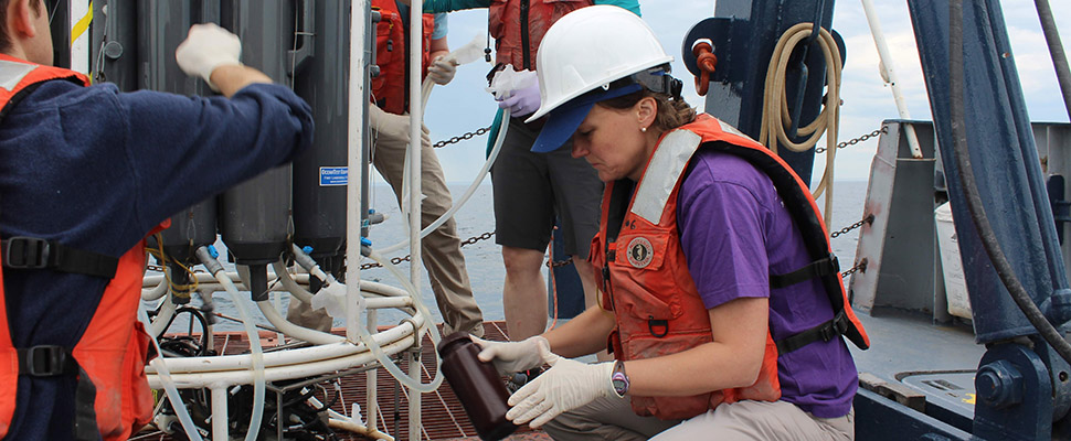 Maureen Coleman on boat in hard hat