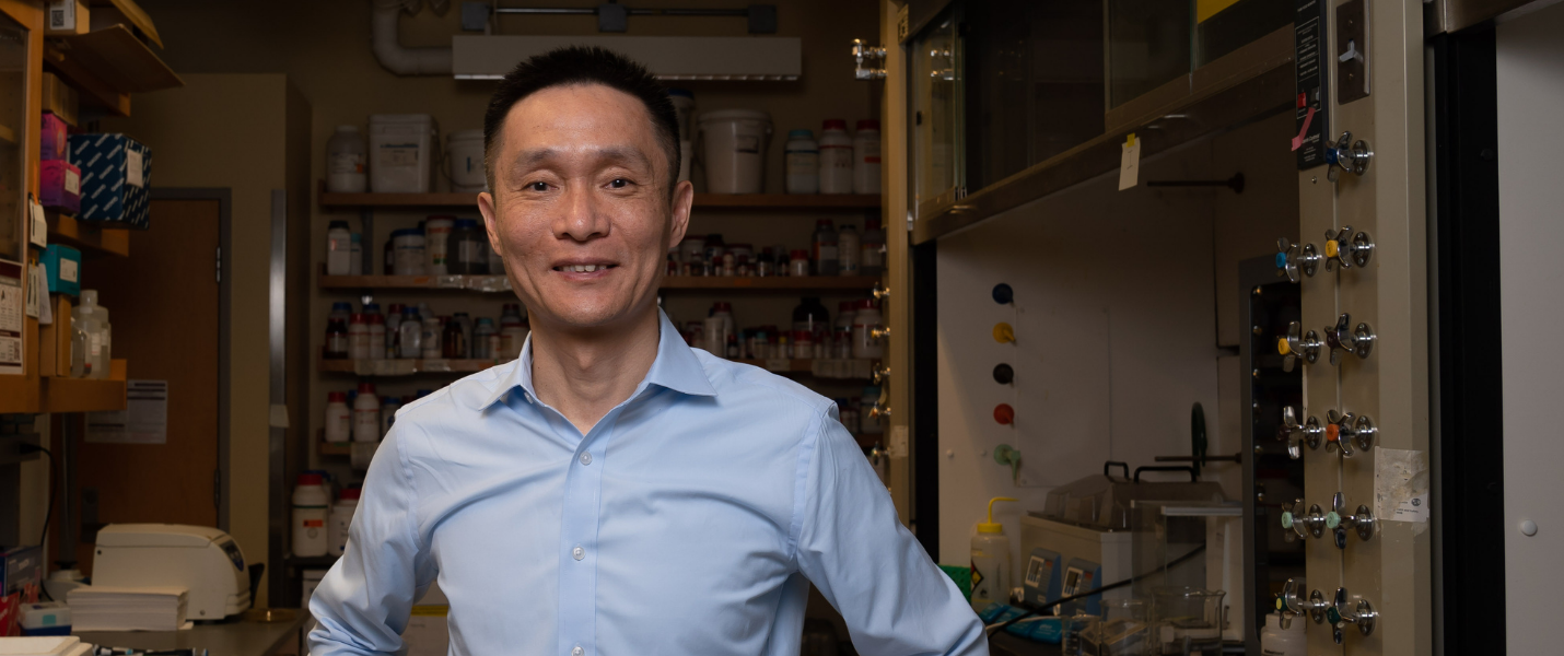 Chuan He in his lab