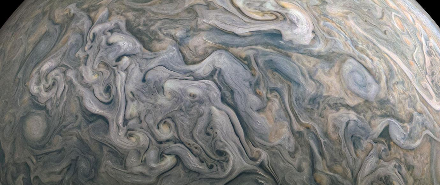 Gigantic storms swirl across the surface of Jupiter