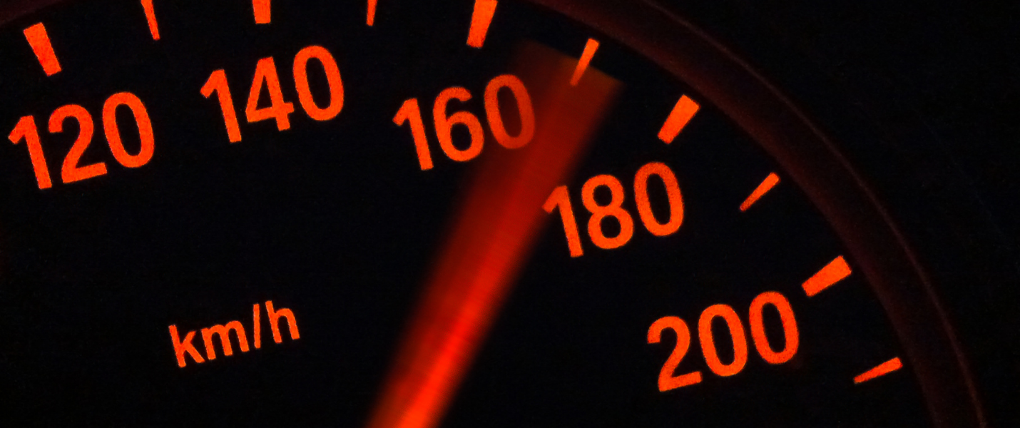 red speedometer reading 170 km/h on black background