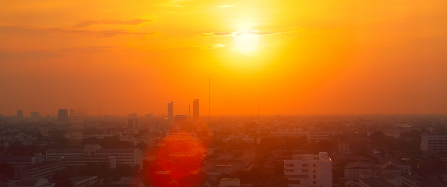 city under a blazing sun