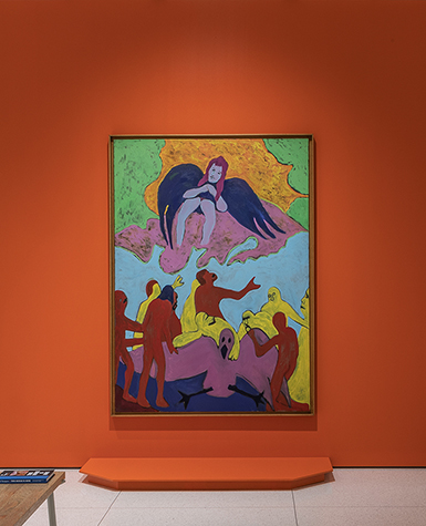 A painting of the assumption hanging on an orange wall
