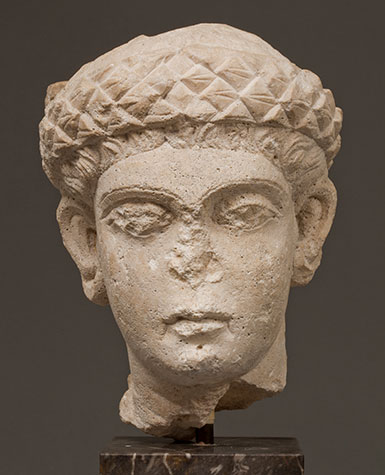 Unidentified Artist, North African, probably Carthage, Head of an Emperor or Female Head (An Empress?), c. 4th–5th century, Carved limestone high relief. Smart Museum of Art, The University of Chicago, Gift in memory of John W. McKay, Trail, B.C. Canada
