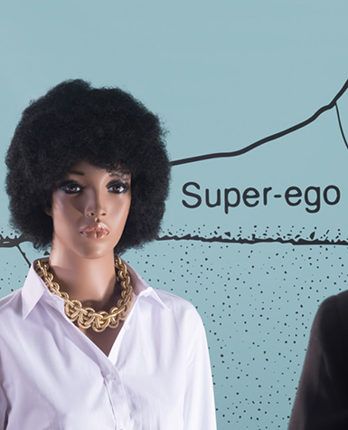 A mannequin stands in front of the words Super-ego.