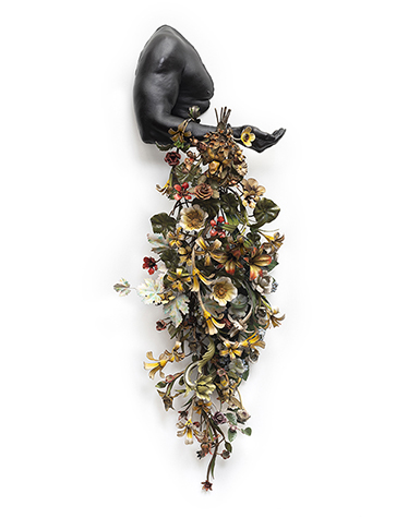 Nick Cave, Arm Peace, 2018, Cast bronze and vintage tole flowers. © Nick Cave. Courtesy of the artist and Jack Shainman Gallery, New York.