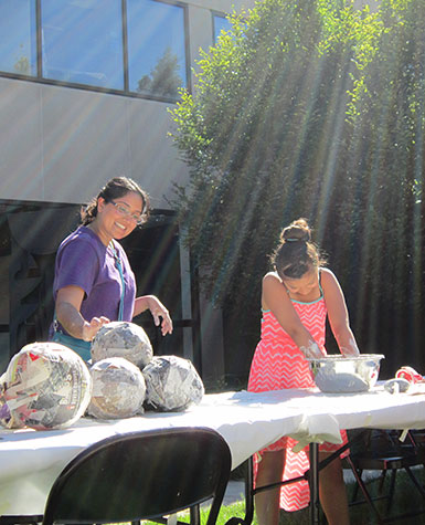 Paper mâché activities in the Smart's courtyard